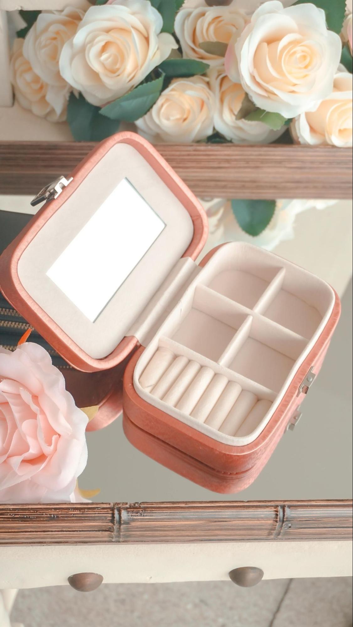 empty jewelry box with mirror on the cover