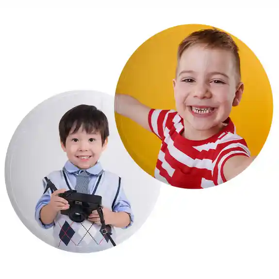 Two photo button pins featuring smiling young boys