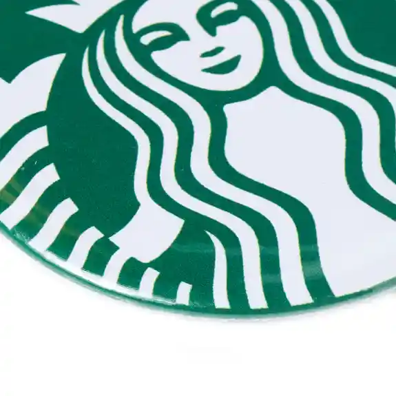 Round button with Starbucks logo