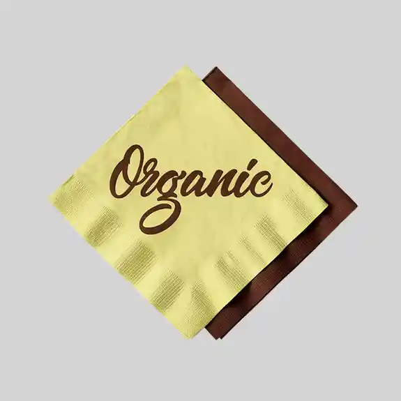 Yellow napkin with brown text reading Organic displayed