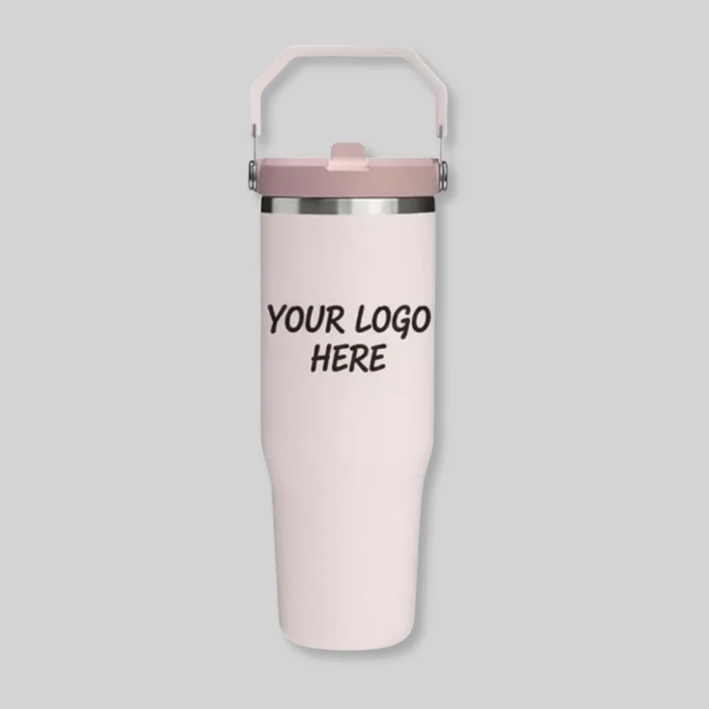 Pink insulated tumbler with handle and flip-straw lid, printed with "Your Logo Here," from SwagPrint’s custom drinkware collection.